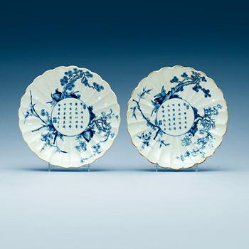 A pair of blue and white Transitional dishes, 17th Century, with Chenghua six character mark.