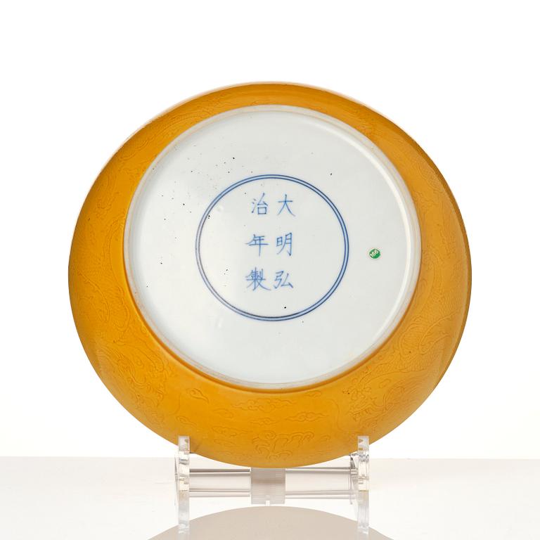 A yellow glazed five clawed dragon dish, Republic, 20th century.