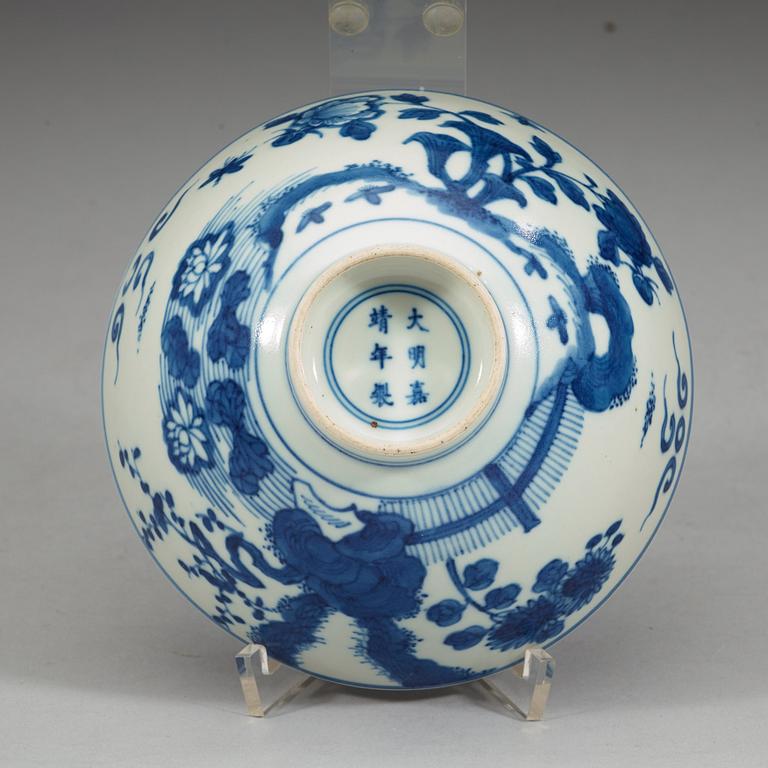 A blue and white bowl, late Qing dynasty with Jiajings six character mark.