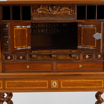 A Baroque style cabinet, circa 1900.