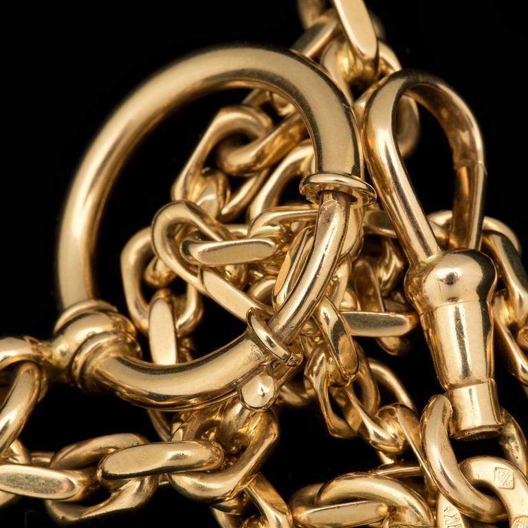 KLOCKKEDJA, 18 k guld. Vikt ca 19 g. (787).