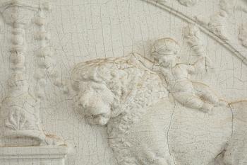 A late Gustavian carved and gesso crest, circa 1800.