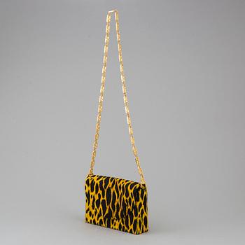 Leopard printed handbag by Gianni Versace.