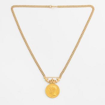 Medalj, "för nit och redlighet i rikets tjänst", guld, med senare kedja i 18K guld.