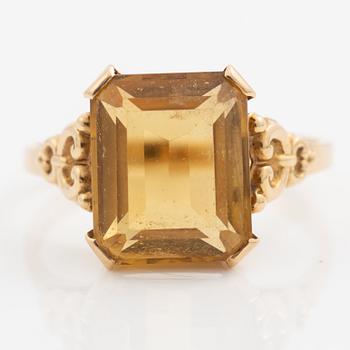 Ring 18K gold with a faceted citrine.