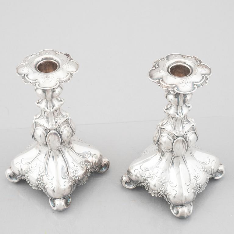 A pair of Baroque style silver candlesticks, GAB, Stockholm, 1950.