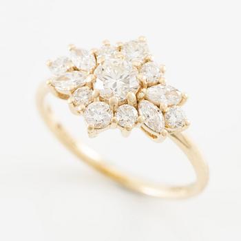 Ring in 14K gold set with brilliant-cut and marquise-cut diamonds.