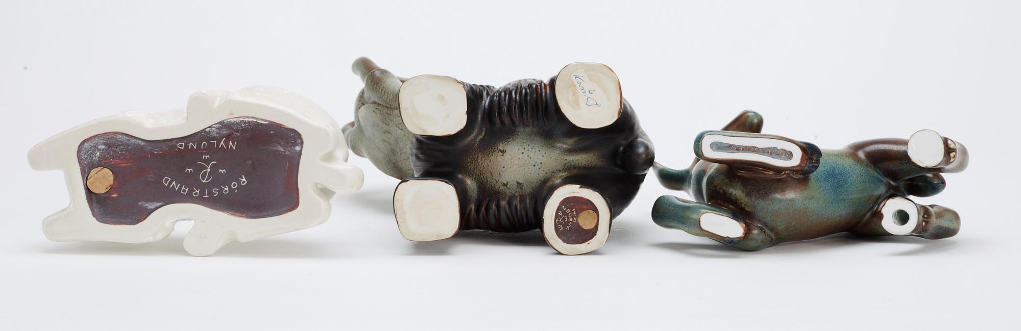 Three Gunnar Nylund stoneware figures, two deer and a mammoth, Rörstrand.