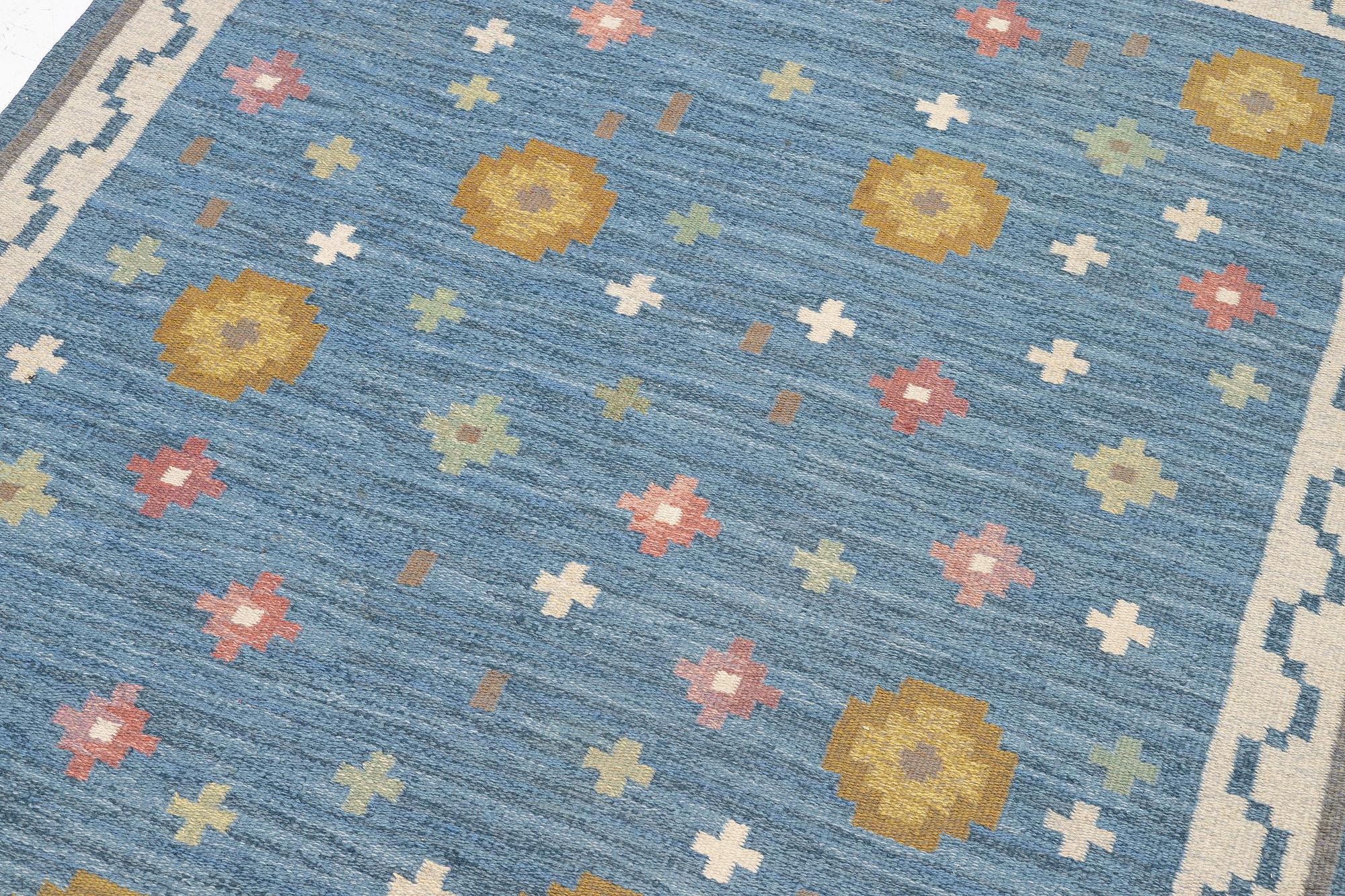 Anna-Greta Sjöqvist, a 'Blomsteräng' carpet, flat weave, c. 240 x 170 cm, signed AGS.