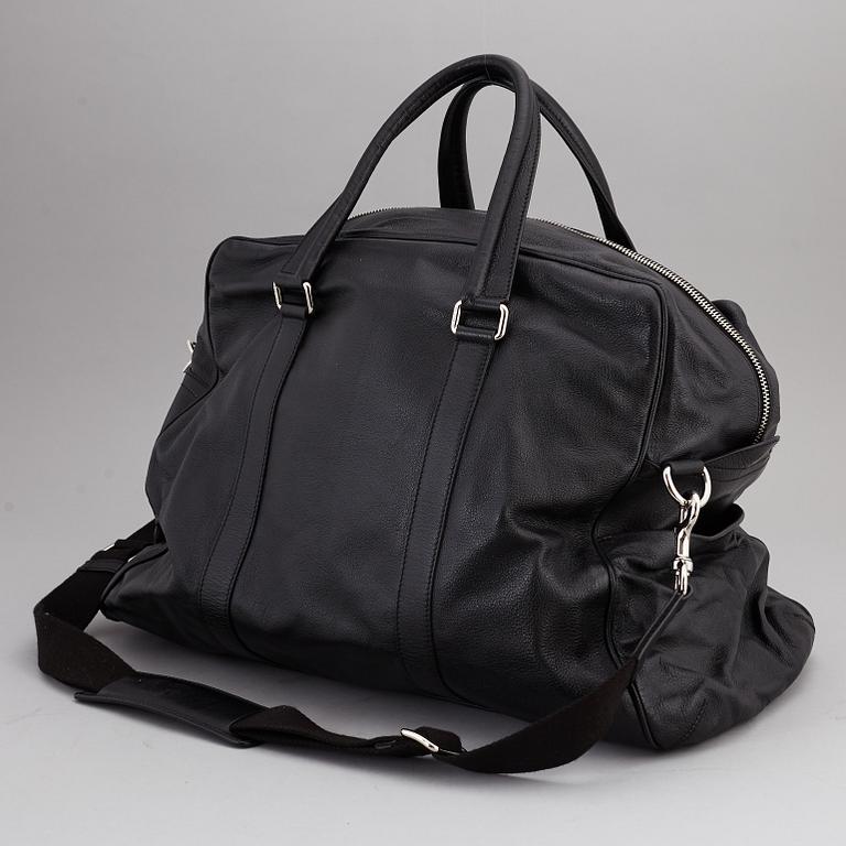 DOLCE & GABBANA, a black leather weekend bag, 2009.