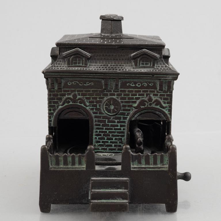 A mechanical bank, late 19th century, probably by Judd Manuf. Comp.