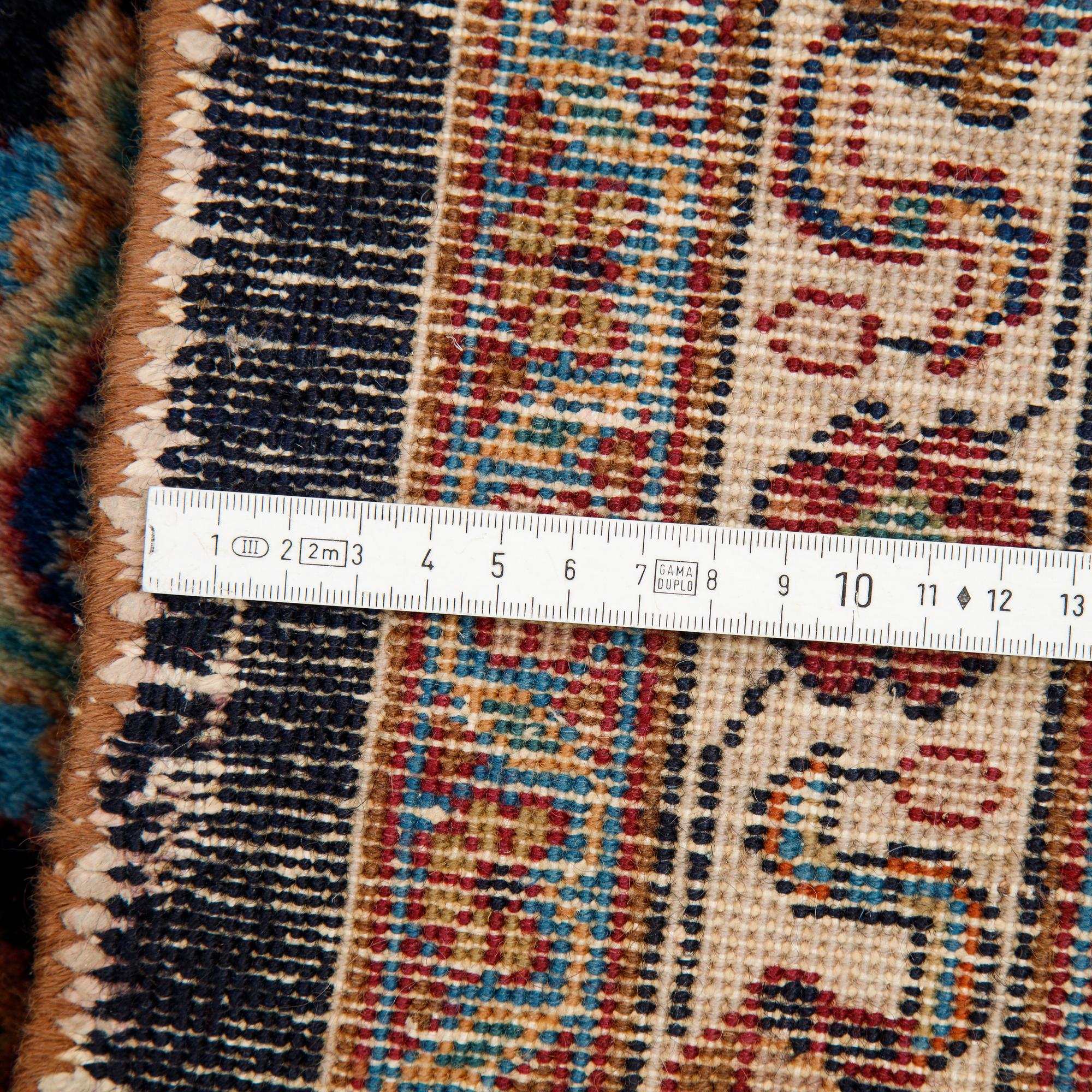 A carpet, Old oriental, ca 347 x 251 cm.