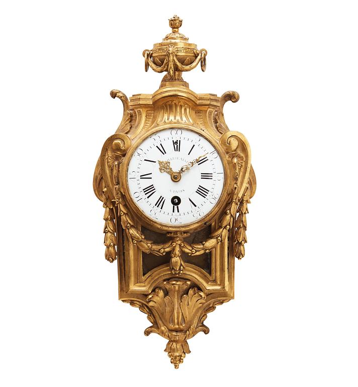 A Louis XVI 1770's gilt bronze wall clock.