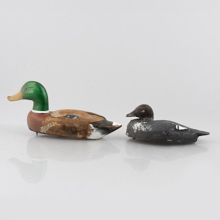 A set of six wooden duck decoys, 20th century.