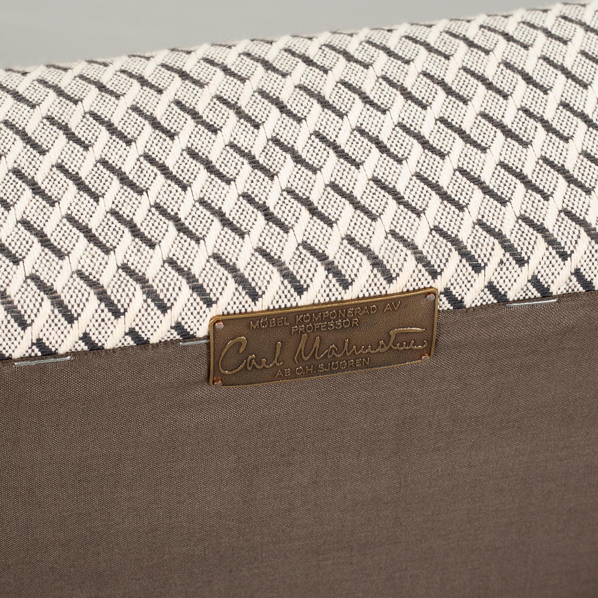 A 21st century"Lata greven" armchair by Carl Malmsten, O.H Sjögren.