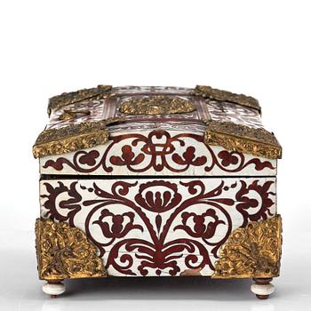 A Baroque 18th century tortoiseshell and antler veneered casket.