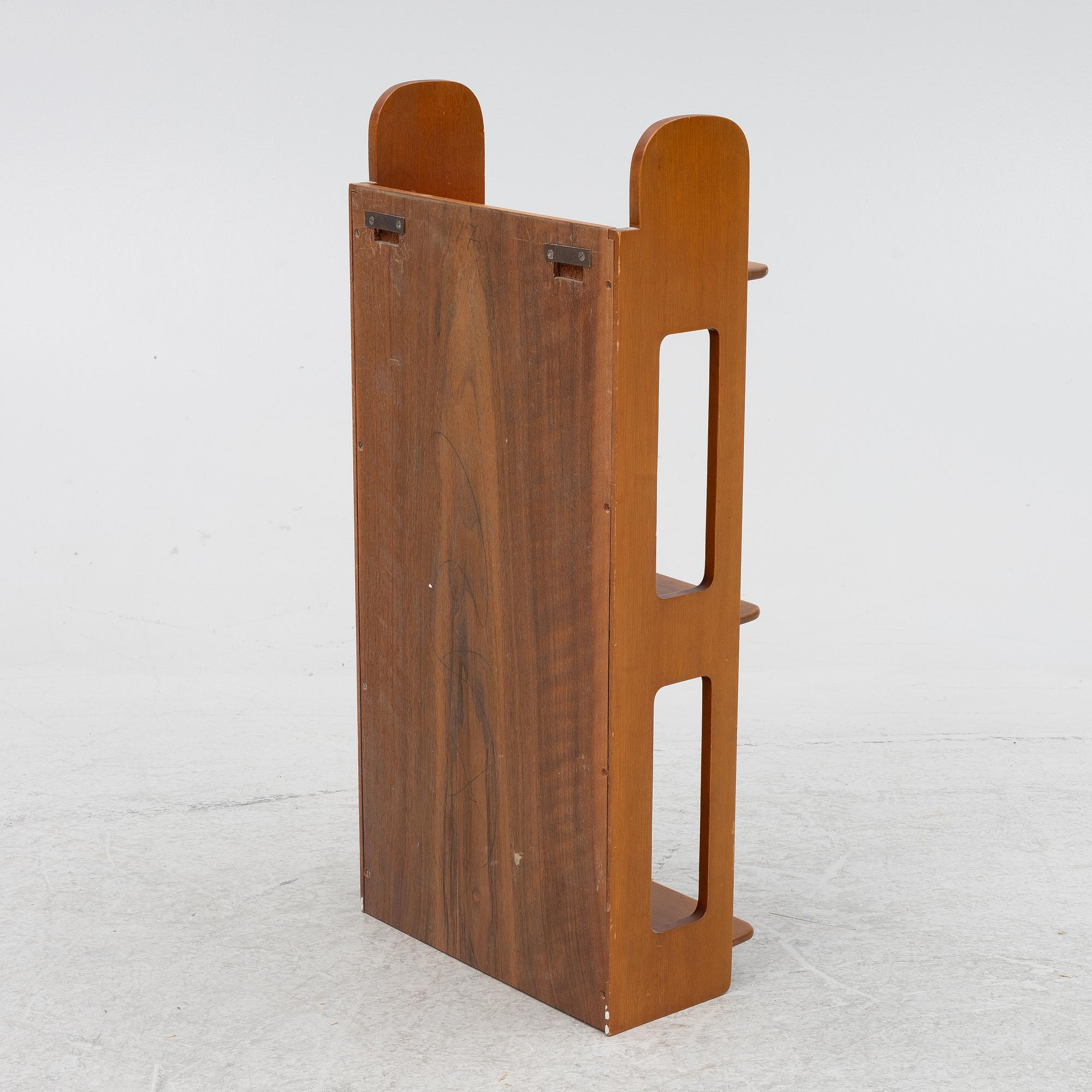 Josef Frank, a model B 2085 wall shelf for Firma Svenskt Tenn.