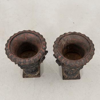 Garden urns, a pair by Skoglund & Olsson, 20th century, cast iron.