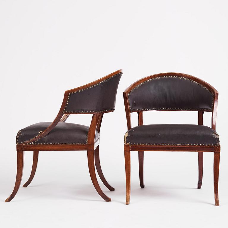 A near pair of mahogany open armchairs, one late Gustavian, Stockholm circa 1800.