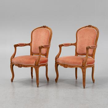 A pair of Louis XVI beechwood armchairs, 18th Century.