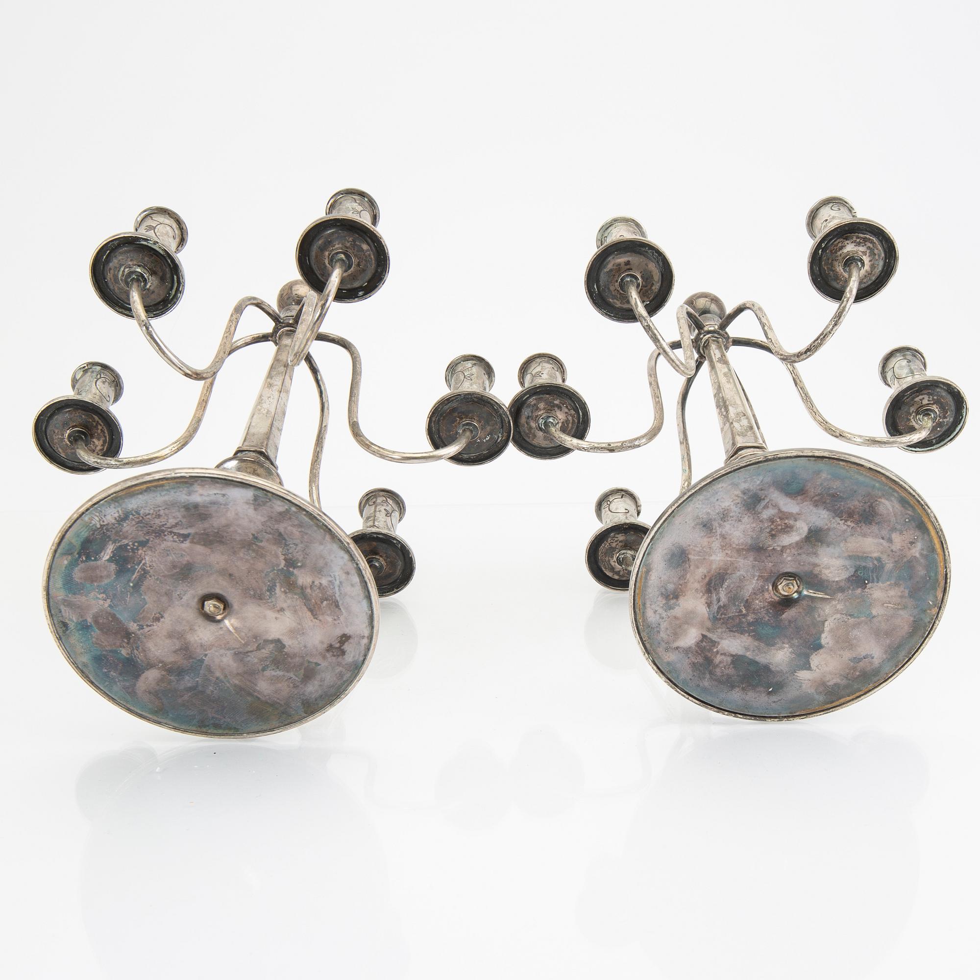 A Swedish 20th century pair of silver candelabras mark of CG Hallberg Stockholm 1928 possibly Elis Bergh.