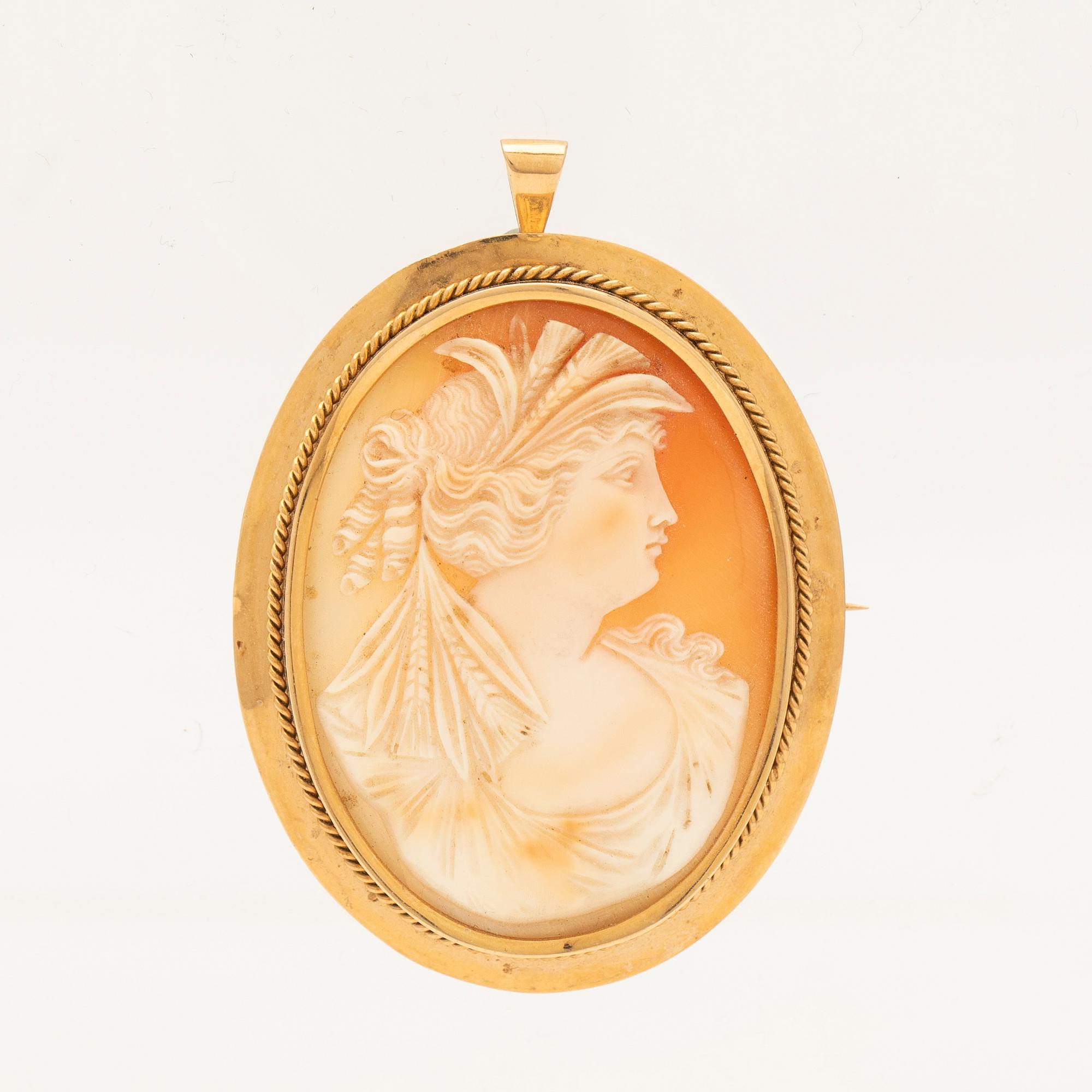 Brooch, 18K gold with shell cameo.