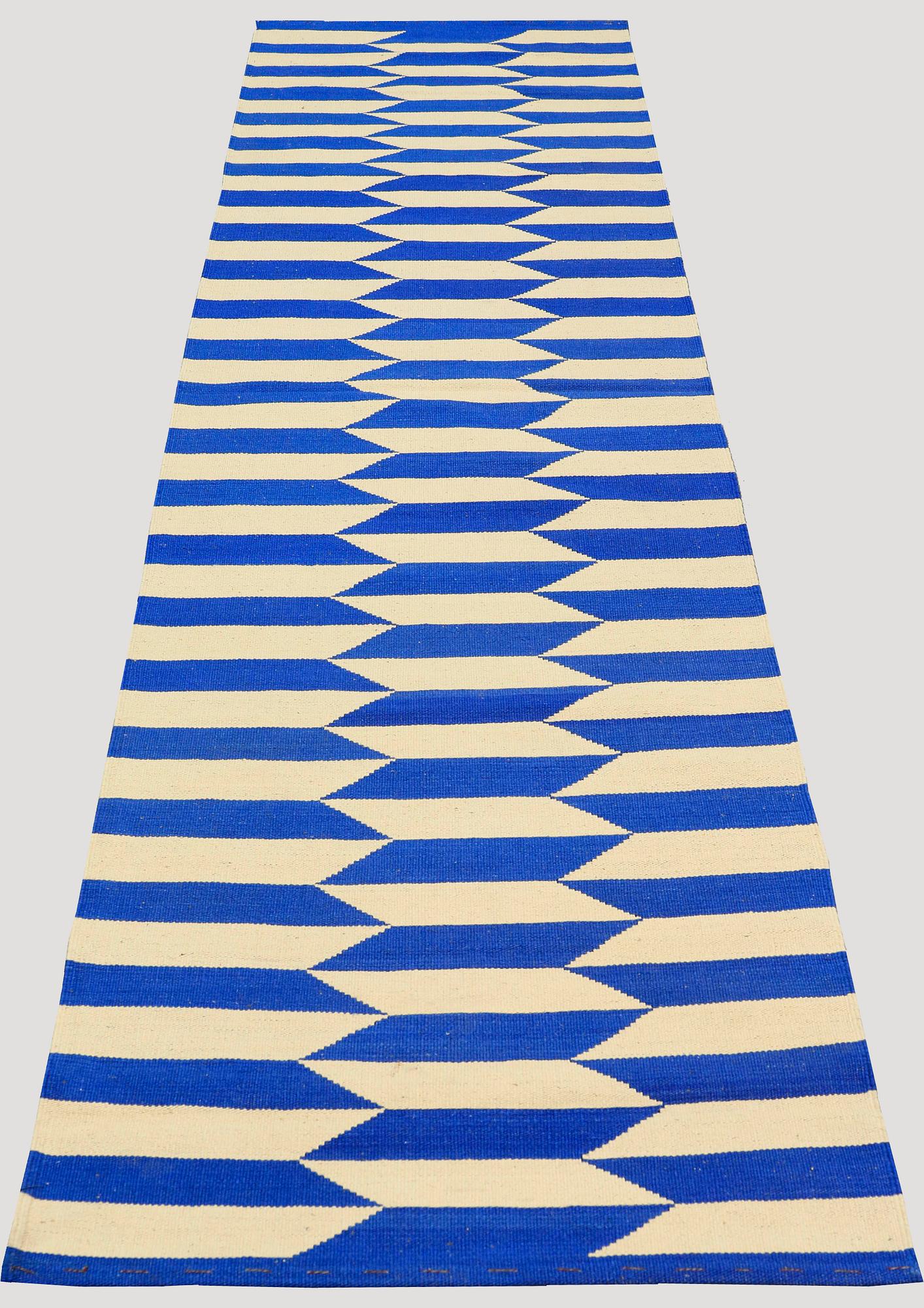 A runner, flat weave, ca 298 x 82 cm.