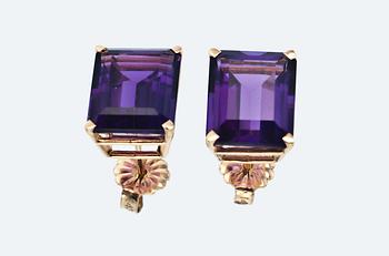 A PAIR OF AMETHYST EAR STUDS.