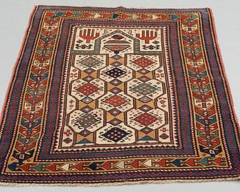 A RUG, an antique Caucasian prayer rug, Czar Russia, ca 144-151 x 103-106 cm.