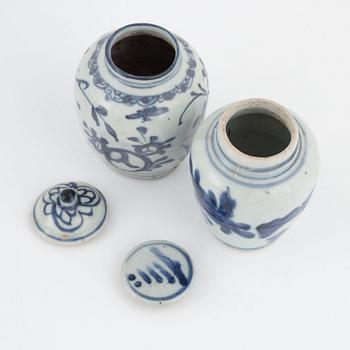 Five blue and white porcelain and ceramic urns, Ming dynasty, (1368-1644).