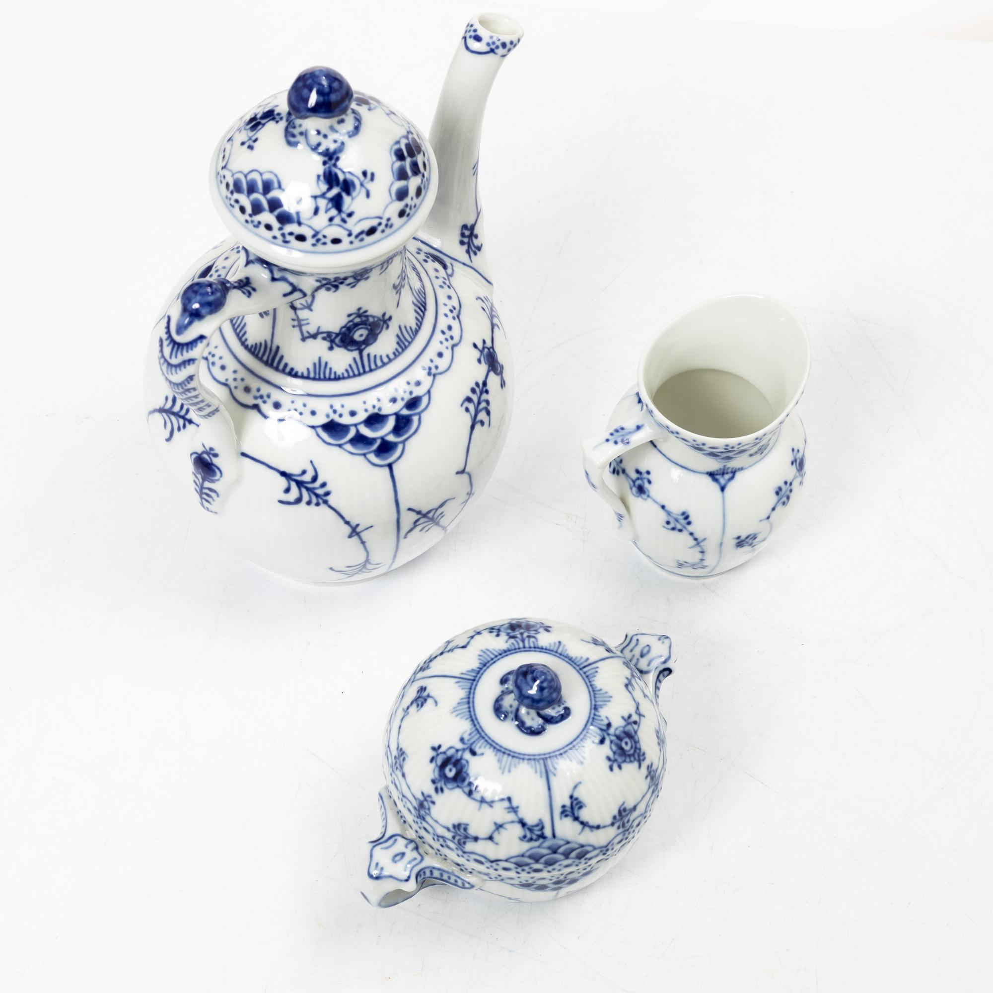 Royal Copenhagen, a 32-piece porcelain 'Blue Fluted' coffee service, mostly half lace, Denmark, 1950's/60's.