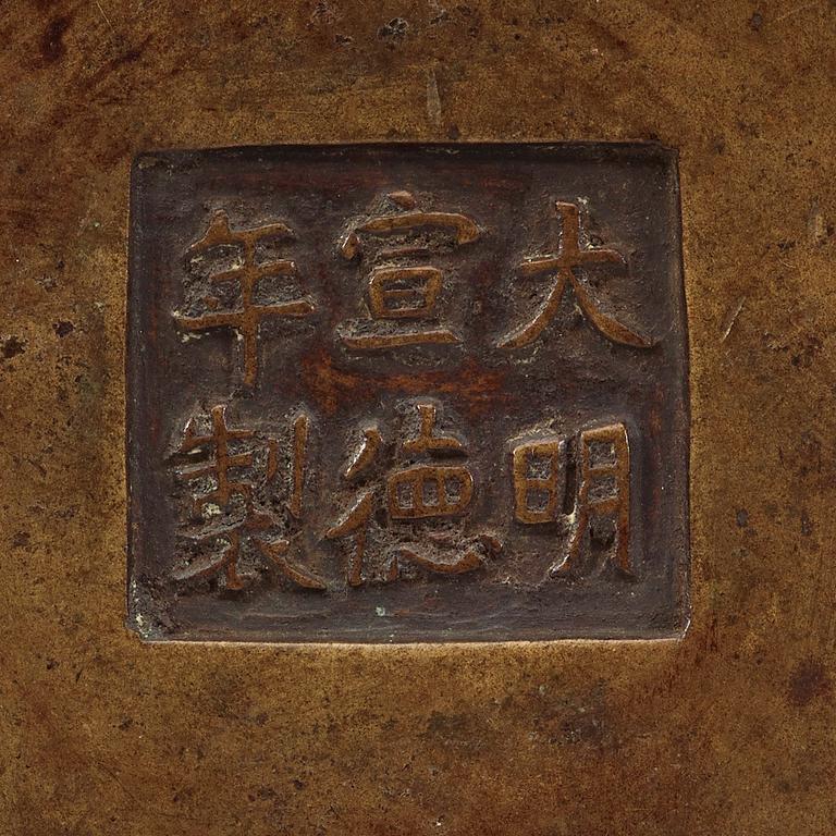 A bronze cencer, Ming dynasty. With Zhengdes six characters mark.