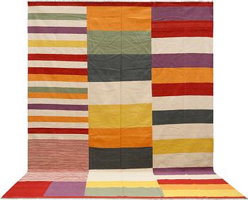 A flat weave carpet, c 395 x 297 cm.