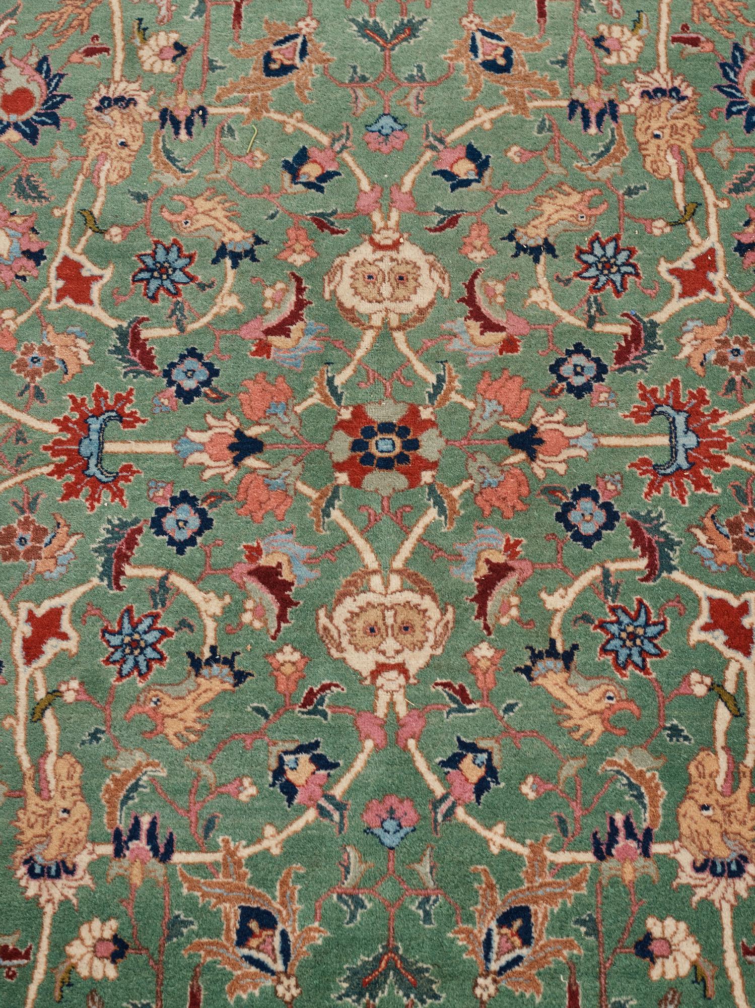 A carpet, a semi-antique Tabriz, ca 374-376,5 x 268-276 cm.