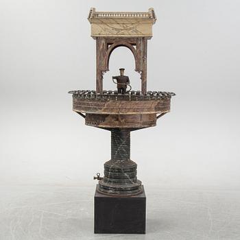 A painted and richly decorated plate garden fountain, late 19th century.