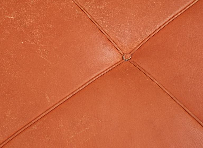 A Poul Kjaerholm 'Pk-80' brown leather aand steel daybed, Fritz Hansen, Denmark.