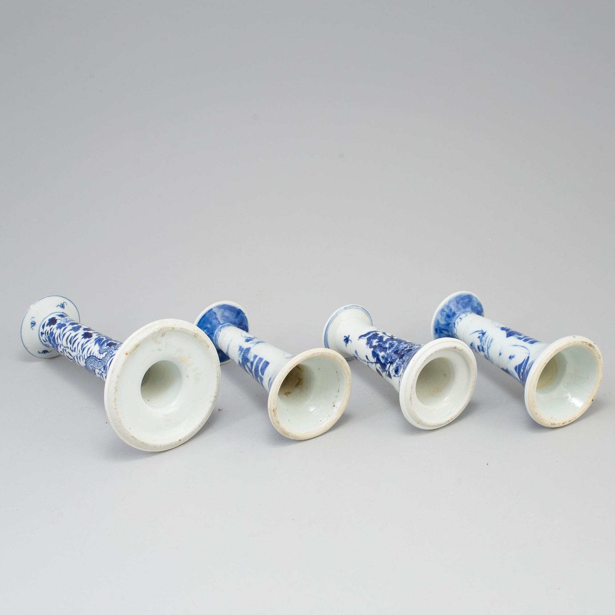 Four chinese 19th century blue and white porcelain candle holders. Qing dynasty.