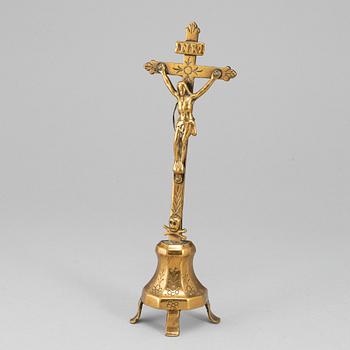 An 18th century brass crucifix.