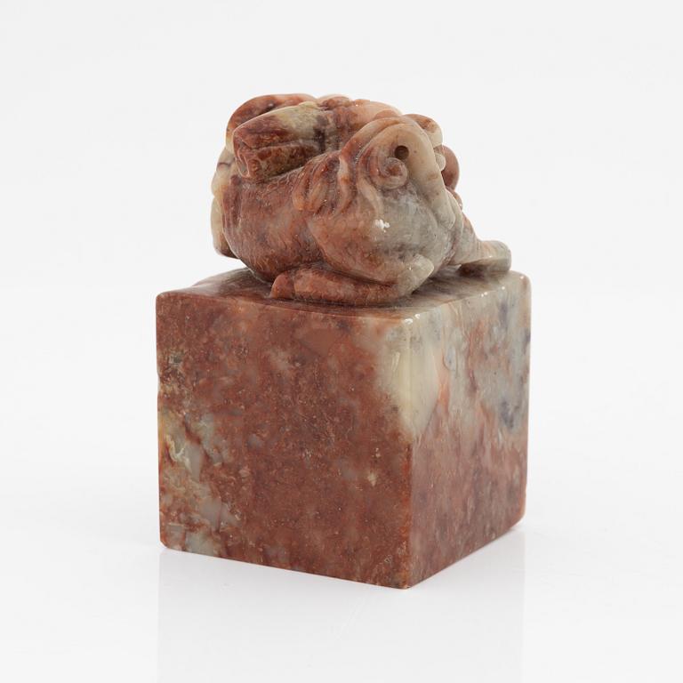 A celadon dish, for the south east asian market, double fish, Mingstyle, 20th Century. And a Chinese sealstone.