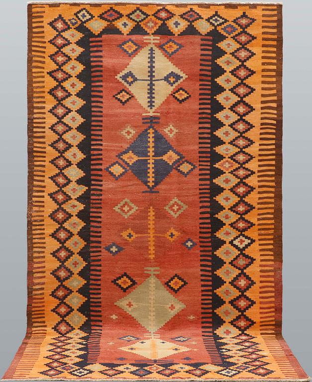 A kurdish kilim carpet, ca 320 x 180 cm.