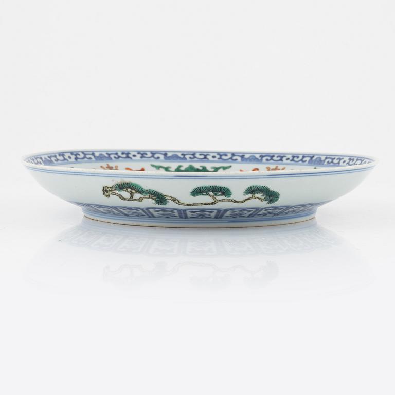 An enamelled and iron red Chinese dish, 20th century.