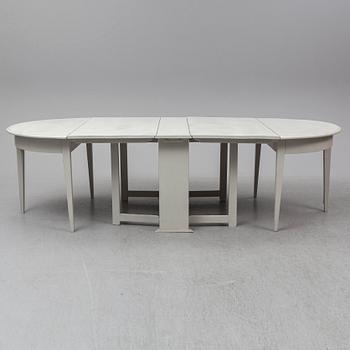 A painter three-part dining table, 19th Centruy.