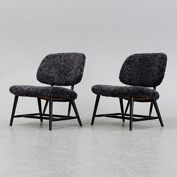 A 1950's pair of 'TeVe' easy chairs by Alf Svensson.