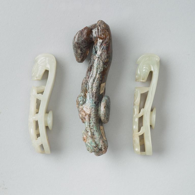 A set of three Chinese belt buckles, 20th Century.