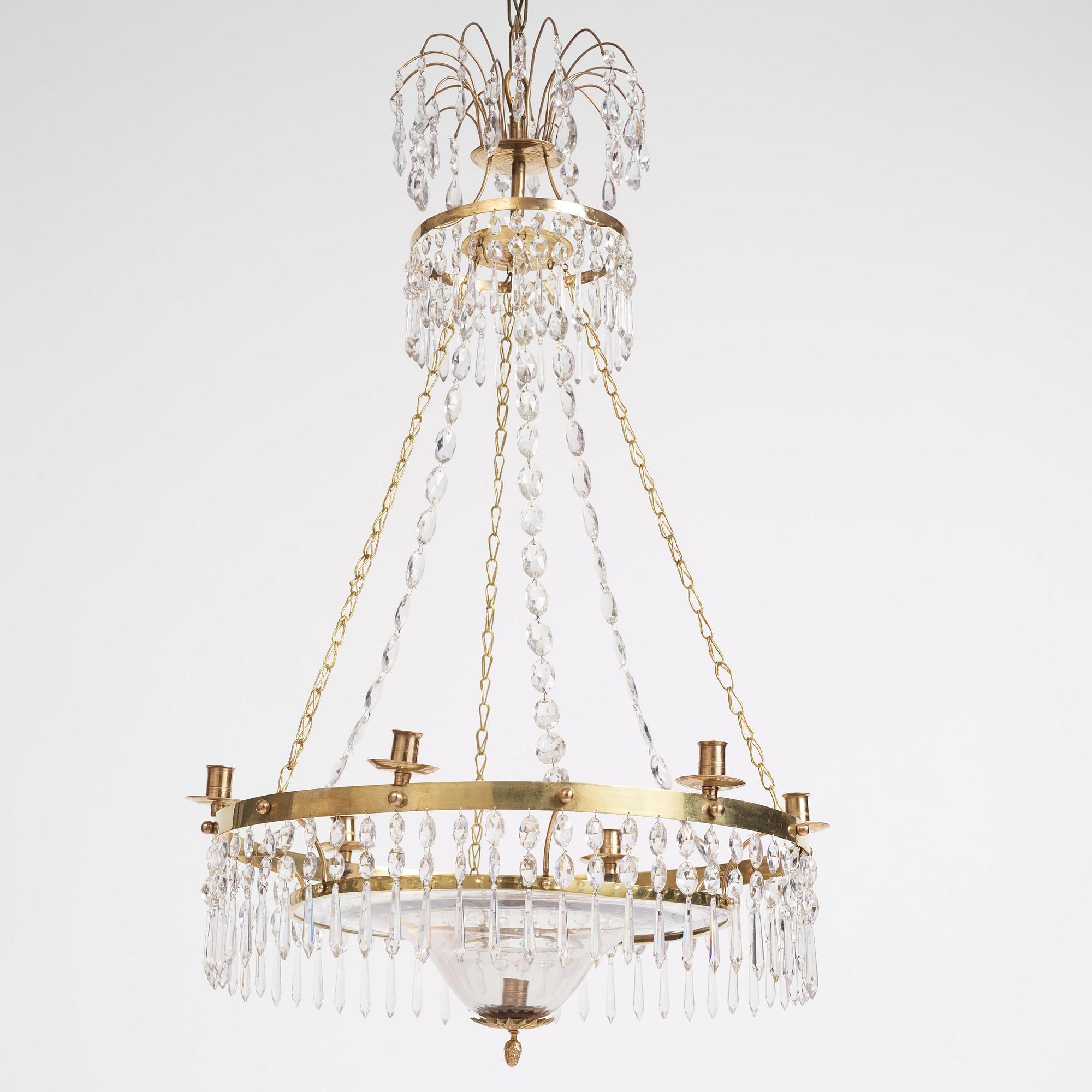 A late Gustavian gilt brass and cut glass seven-light chandelier, late 18th century.