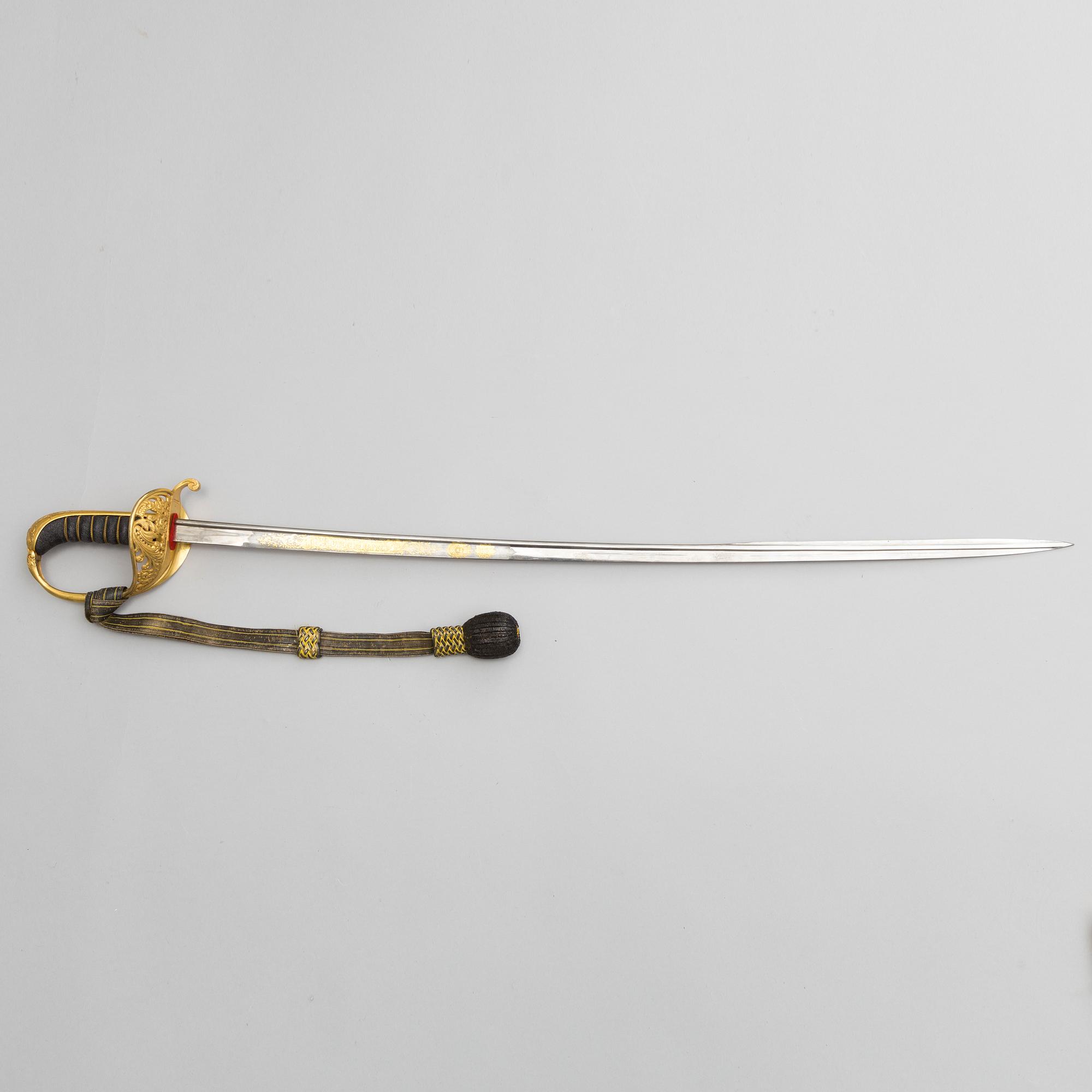 A Swedish second half of the 19th century sabre with scabbard.