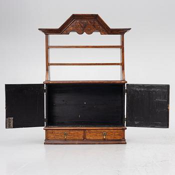 A late Baroque wall cabinet with shelves, first half of the 18th century.