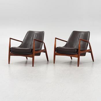 Ib Kofod-Larsen, a pair of "Sälen" dark brown leather chairs, Olof Perssons Fåtöljindustri (OPE), Jönköping.