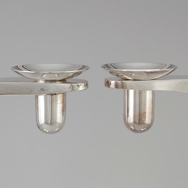 RICHARD FOX, a pair of three armed, four light sterling candelabra, London, 2001 and 2013.