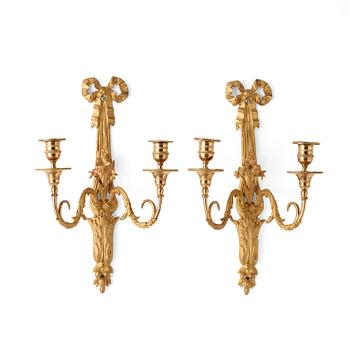580. A pair of Louis XVI late 18th century gilt bronze two-light wall-lights.